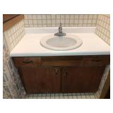 Bathroom sink with cabinet (WILL NEED REMOVED)