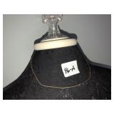 Dainty chain marked 14K