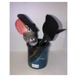 Signed stoneware with kitchen utensils