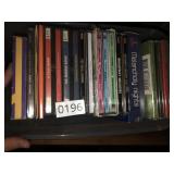 CDs and Cassette tapes in small tote