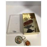 Badges, key chains, and 3 hats