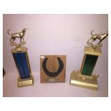 3 trophys and 2 dog magazines