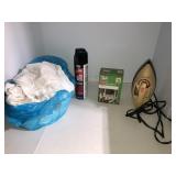 Mini lights, iron, cleaning rags, insect killer