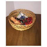 Basket with misc cat and dog leashes, puppy pads