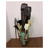 Large heavy glass vase with kitchen utensils