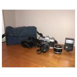 Canon FTB  camera with lens,flash, and case
