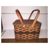 Double handled pie basket with misc plasticware
