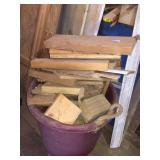 Misc pieces of wood in tub and in barrel