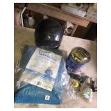 Tarp, helmet, nuts and bolts
