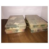 4 plastic containers with embroidery floss/thread