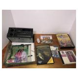 Car radio, CDs, computer games, poncho