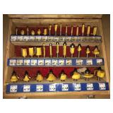 Set of router bits in wooden case