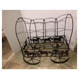 Child's saddle and metal wagon decor