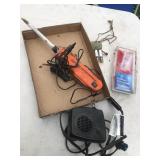 Electric Outdoorsmen saw, tail lamp lens, misc