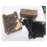 Metal roofing nails, net, and small tackle box