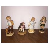 4 porcelain Avon figurine dolls