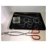 Cookie sheet, grill tongs, Simmons grabber