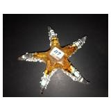 Crystal Xpress 6.5in amber w/white specks starfish