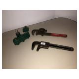 2 pipe wrenches and 3 way plug