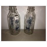 2 Homestead glass milk bottles