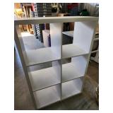 Pass-Through Shelving Unit With Six Cubbies