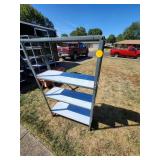 Metal Shelving Unit With Three Shelves