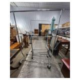 Three Rolling Laundry Racks