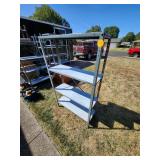 Metal Shelving Unit With Three Shelves