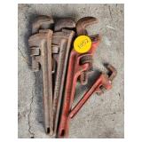 Four Heavy-Duty Pipe Wrenches