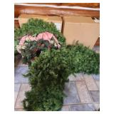 Variety of Garland and Greenery With Pine Cones