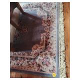 4 Floral Rugs of Various Sizes
