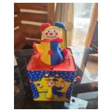 Colorful Jack-in-the-Box Toy with Clown Design