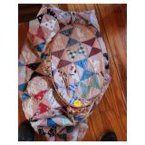 Unfinished Quilt With Wooden Hoop and Fabric Piece