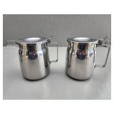 Two Stainless Steel Pitchers with Hinged Lids