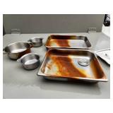 Stainless Steel Pans and Casserole Dish with Rust