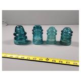 Four Hemingray Glass Insulators in Aqua Blue