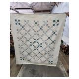Hand-Stitched Quilt with Floral and Geometric Desi