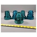 Five Hemingray Glass Insulators