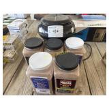 Case tumbler & 5 jugs of cleaner