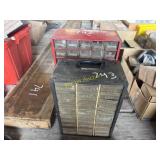 Bolt bins with assorted nuts and bolts