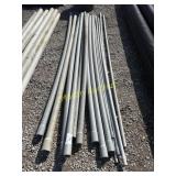 Assorted pile of gray electrical conduit