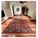 Fringed woven area rug