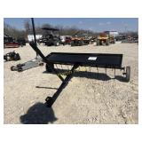 Tow behind Dethatcher