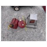 Two gas cans and a strobe light