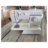Sewing machine with attachments  RWC