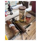 Vintage flashlight, balancer, air pump, and