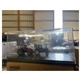 1/64 scale case 135 and Ford 9700 tractors