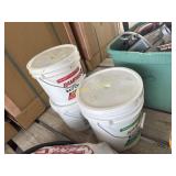 Three buckets of rat bait