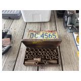 Vintage license plates and tool set