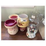 Snow globe and wax melters